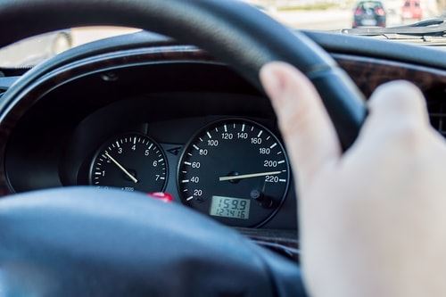 Driver Looking at Odometer 